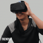 photo of a woman using virtual reality equipment